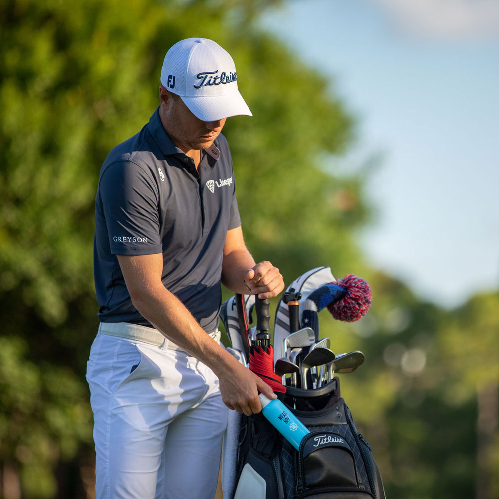 Justin Thomas with WearSPF Golf Bag